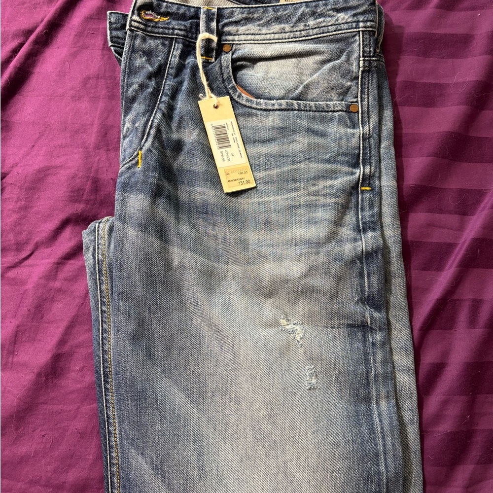 Men's NWT Diesel distressed jeans. Originally $ 198 , sale $ 131.90.